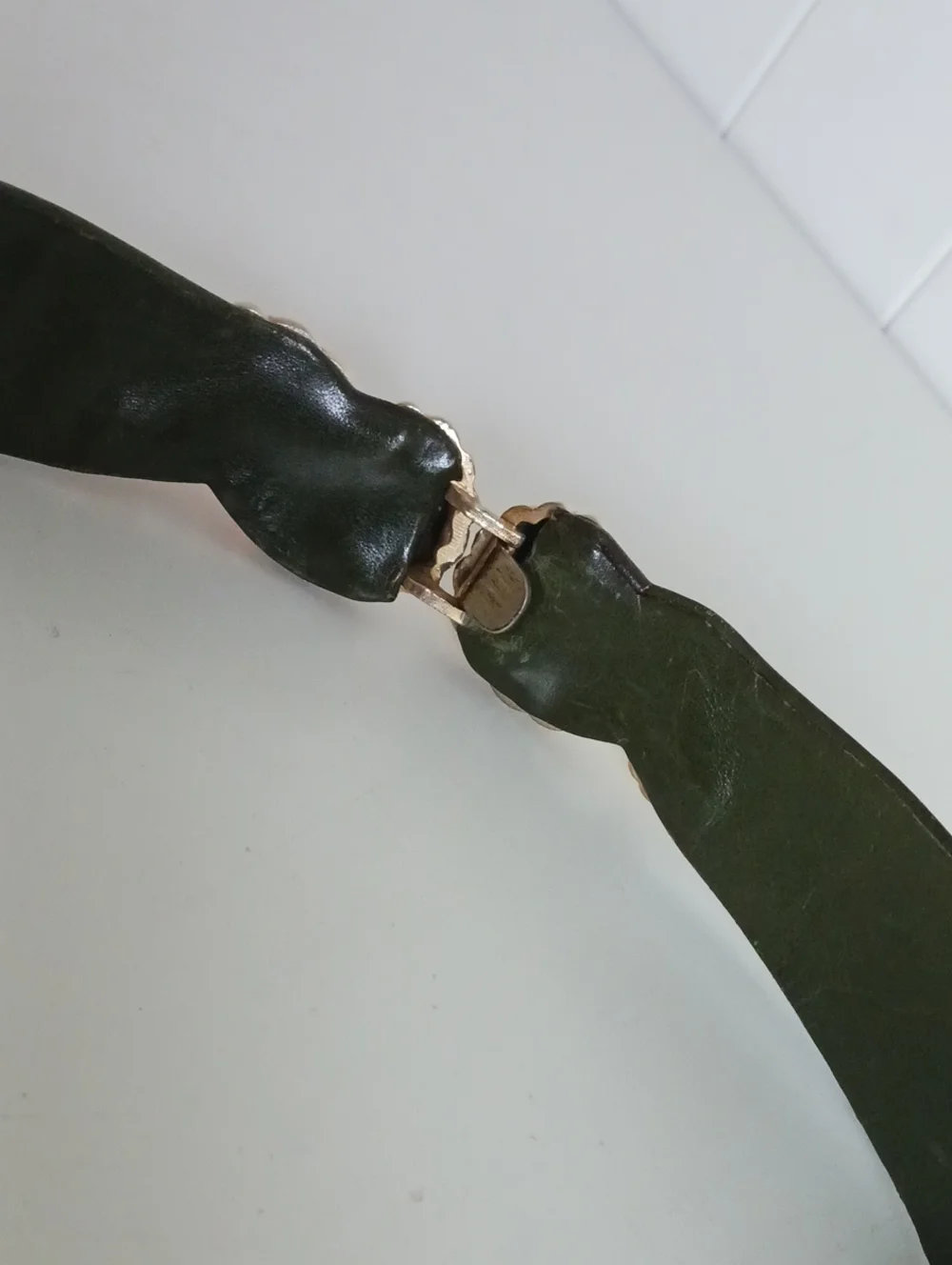 JUDITH LEIBER VTG GOLD BUCKLE W GREEN BELT.